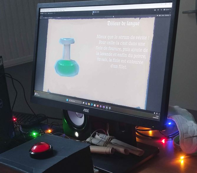 Photographie d'un écran qui affiche un dessin de grimoire ouvert, on peut y lire la recette du délieur de langue